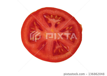 Whole and cut red tomatoes, sliced, sliced on a white plate in isolation 136862048