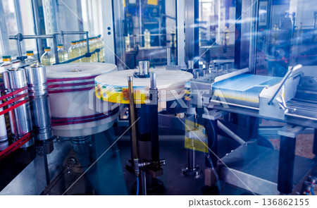 Automatic labeling machine during operation. Factory for the production 136862155