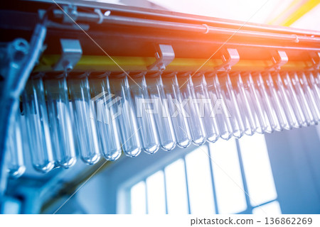 The plastic bottle blowing machine. PET preforms for blowing of plastic bottles 136862269