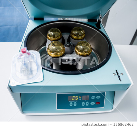 Platelet-Rich plasma preparation. Centrifuge. Modern medical background Platelet-Rich plasma preparation. Centrifuge. Modern medical background 136862462