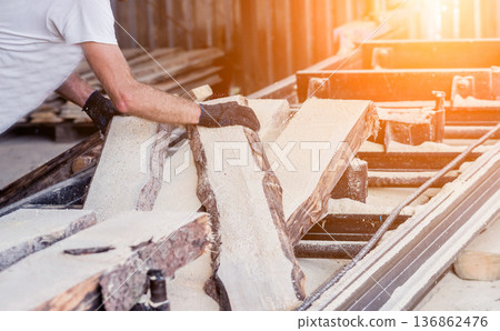 Modern sawmill. Industry sawing boards from logs Modern sawmill. Industry sawing boards from logs 136862476