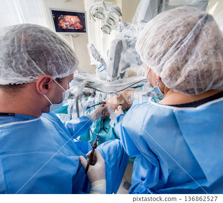 Modern surgical system. Medical robot. Minimally invasive robotic surgery. Modern surgical system. Medical robot. Minimally invasive robotic surgery. 136862527