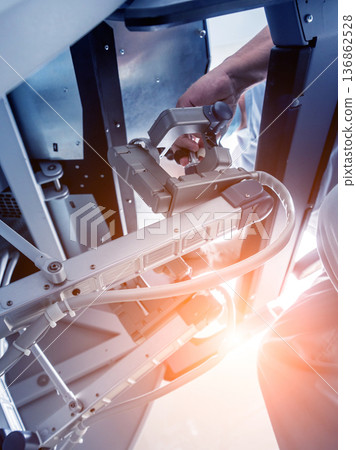 Modern surgical system. Medical robot. Minimally invasive robotic surgery. Modern surgical system. Medical robot. Minimally invasive robotic surgery. 136862528