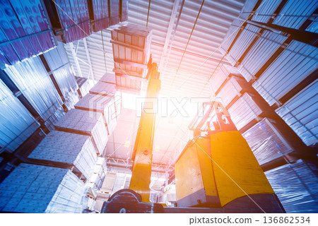 Forklift loader in storage warehouse ship yard. Distribution products. Forklift loader in storage warehouse ship yard. Distribution products. 136862534