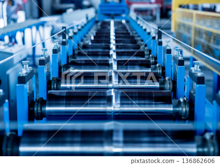 Metal sheet forming machine at the modern metalwork factory. Metal sheet forming machine at the modern metalwork factory. 136862606