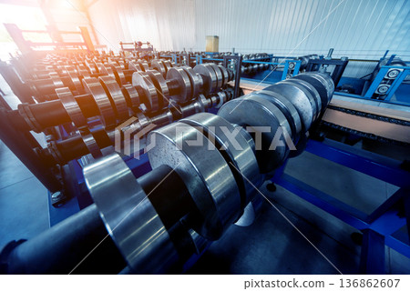 Metal sheet forming machine at the modern metalwork factory. Metal sheet forming machine at the modern metalwork factory. 136862607