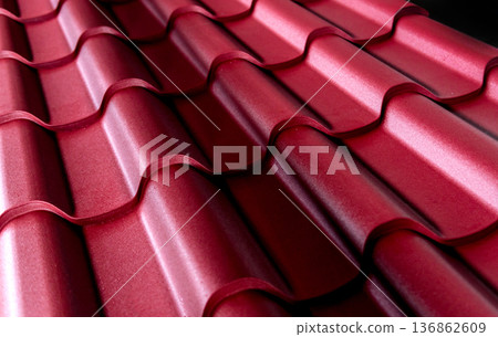 Red metallic roof tiles background with drops of water. 136862609