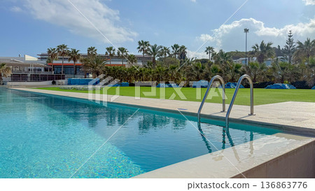 Swimming pool in the tropical resort Swimming pool in the tropical resort 136863776