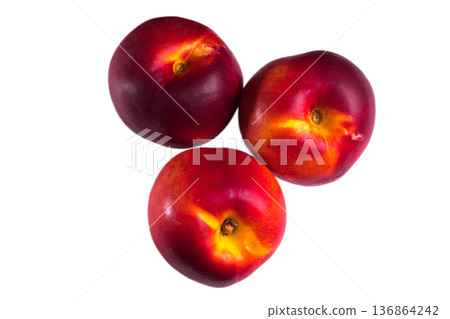 three whole peach on a white background in isolation 136864242