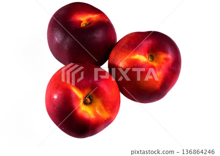 three whole peach on a white background in isolation 136864246