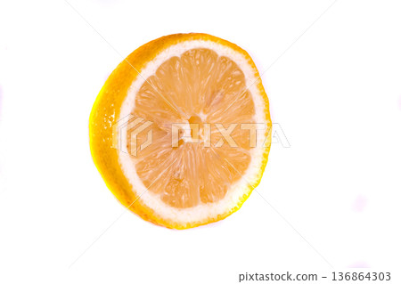 Half a lemon on a white background in isolation Half a lemon on a white background in isolation 136864303
