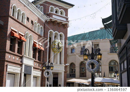 Luxury street architecture with holiday wreaths in Beverly Hills Rodeo Drive Luxury street architecture with holiday wreaths in Beverly Hills Rodeo Drive 136864597
