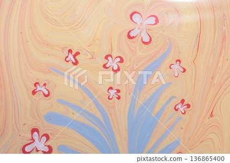 Vibrant psychedelic floral Ebru marbling art background with swirling liquid paint textures 136865400