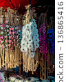 colorful crowns for sale made of fake flowers 136865416