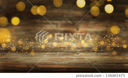Rustic wooden surface with golden bokeh lights, festive and cozy holiday background 136865473