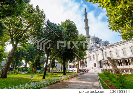 blue mosque park in istanbul. one of the most popular travel landmark in turkey. architecture and nature landscape in summer. unesco world heritage site photography blue mosque park in istanbul. one of the most popular travel landmark in turkey. architecture and nature landscape in summer. unesco world heritage site photography 136865524