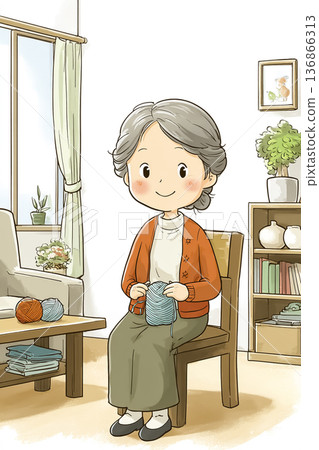 一位老婦人在家織毛衣。這張圖片展現了寧靜的生活和居家時光。 136866313