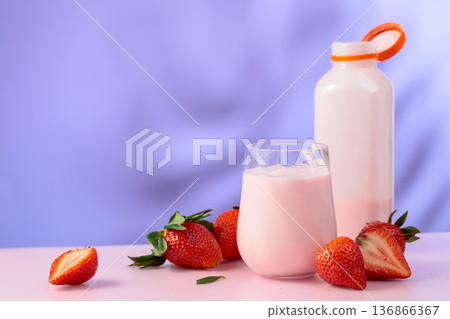 Strawberry yogurt in an eco-friendly disposable jar and fresh berries. Strawberry yogurt in an eco-friendly disposable jar and fresh berries. 136866367