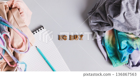 Clearing space and life of excess, sorting clothes concept top view web banner Clearing space and life of excess, sorting clothes concept top view web banner 136867563