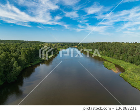 Aerial View of a Serene River and Lush Forest in Belarus Aerial View of a Serene River and Lush Forest in Belarus 136868231