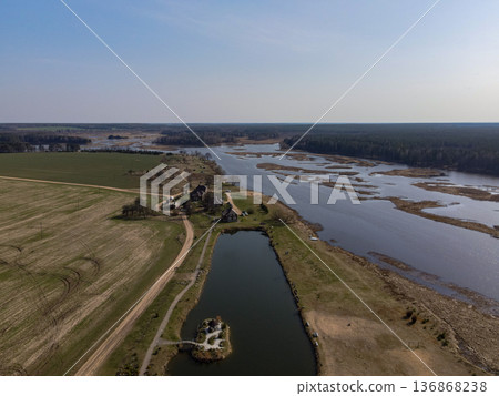 Aerial View of Rural Landscape with Pond and Forest in Belarus Aerial View of Rural Landscape with Pond and Forest in Belarus 136868238