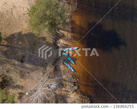 Aerial View of Lakeshore with Kayaks and Sparse Vegetation in Belarus Aerial View of Lakeshore with Kayaks and Sparse Vegetation in Belarus 136868253
