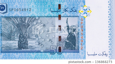 Cash banknote currency Malaysia is represented by banknotes of Malaysia paper currency in denominations fifty ringgit Cash banknote currency Malaysia is represented by banknotes of Malaysia paper currency in denominations fifty ringgit 136868273