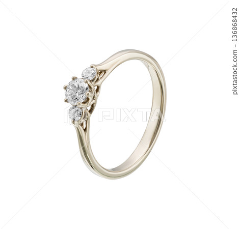 Yellow gold three stone diamond ring, minimalist engagement jewelry isolated Yellow gold three stone diamond ring, minimalist engagement jewelry isolated 136868432