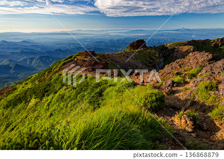 Morning mountain range seen from Mount Chokai and the Seven High Mountains Morning mountain range seen from Mount Chokai and the Seven High Mountains 136868879