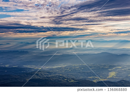 Mountain ranges bathed in the morning sun as seen from Mt. Chokai Mountain ranges bathed in the morning sun as seen from Mt. Chokai 136868880