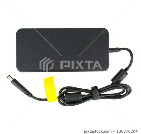 laptop power supply, laptop spare part, isolated on white background laptop power supply, laptop spare part, isolated on white background 136870204
