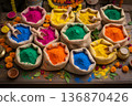 Bright colors of powdered pigments are arranged in bags for a holi festival in an art market during the daytime 136870426