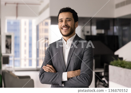 Office portrait of young Arabic businessman dressed in suit 136870552