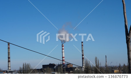 a large pipe from which smoke comes, industry, gas emissions 136870773