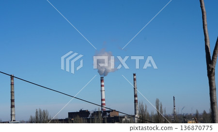 a large pipe from which smoke comes, industry, gas emissions a large pipe from which smoke comes, industry, gas emissions 136870775