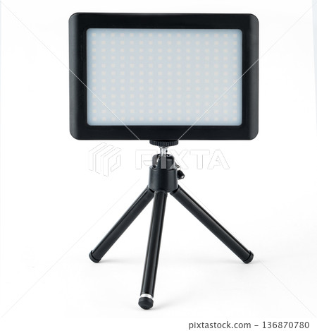 LED panel for video filming, LED lamp, on a white background on a tripod LED panel for video filming, LED lamp, on a white background on a tripod 136870780
