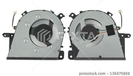 laptop fan, spare parts for a computer, on a white background in isolation laptop fan, spare parts for a computer, on a white background in isolation 136870808