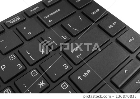 Part of a keyboard for a computer close-up on a white background Part of a keyboard for a computer close-up on a white background 136870835