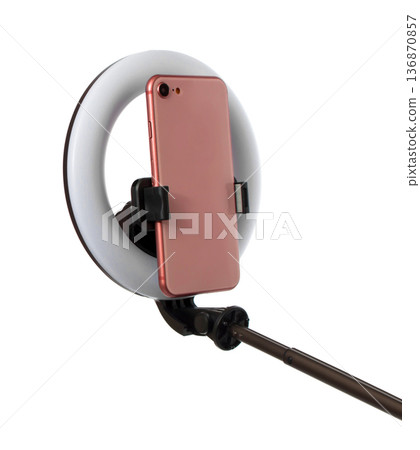 selfie ring lamp with phone, isolated on white background selfie ring lamp with phone, isolated on white background 136870857