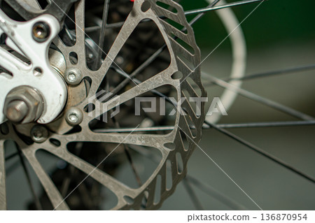 Rotor, brake disk on a bicycle wheel, close up 136870954