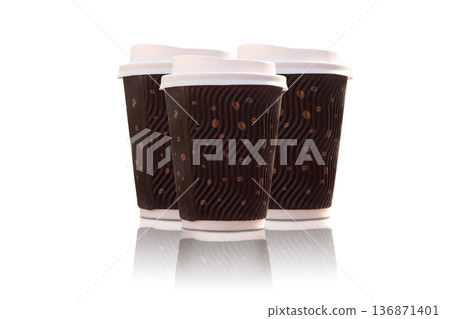 Three disposable coffee glasses with a lid on a white background in isolation 136871401