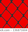 mesh of black braided rope on a red background 136871604