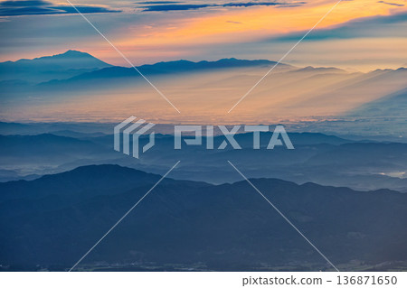 View of the mountain ranges bathed in the morning sun and Mt. Iwate from Mt. Chokai and the Seven High Mountains View of the mountain ranges bathed in the morning sun and Mt. Iwate from Mt. Chokai and the Seven High Mountains 136871650