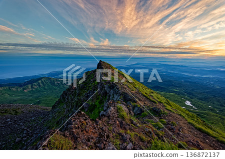 The Sea of Japan in the direction of Akita at dawn as seen from Mount Chokai and Mount Shichitaka The Sea of Japan in the direction of Akita at dawn as seen from Mount Chokai and Mount Shichitaka 136872137