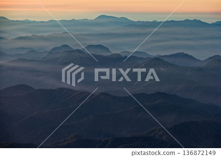View of the mountains in the morning mist from Mount Chokai and the Seven High Mountains View of the mountains in the morning mist from Mount Chokai and the Seven High Mountains 136872149