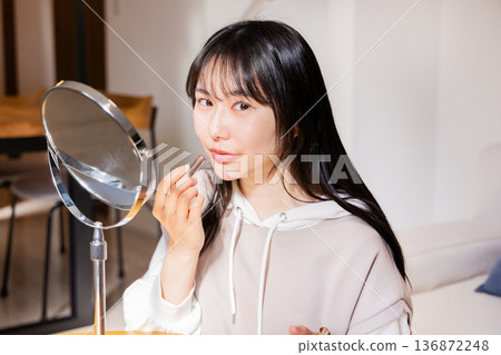 Young lady make-up Young lady make-up 136872248