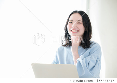 Positive image of improving skills such as qualifications and studying, career advancement, thinking with hand on chin Positive image of improving skills such as qualifications and studying, career advancement, thinking with hand on chin 136875857