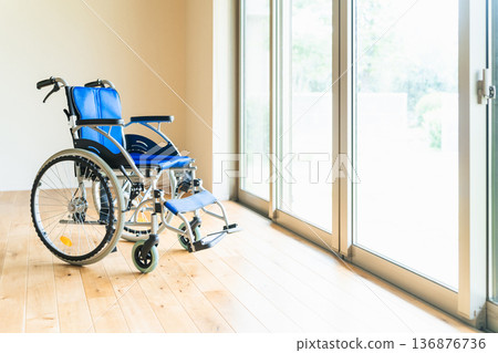 Wheelchair in the room 136876736