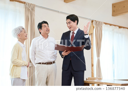 Senior Asian couple looking at a room 136877340