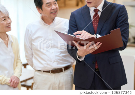 Senior Asian couple looking at a room Senior Asian couple looking at a room 136877345